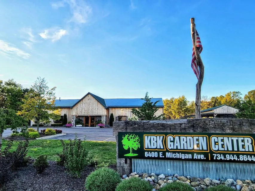 The KBK Garden Center entrance sign along Michigan Avenue in Saline