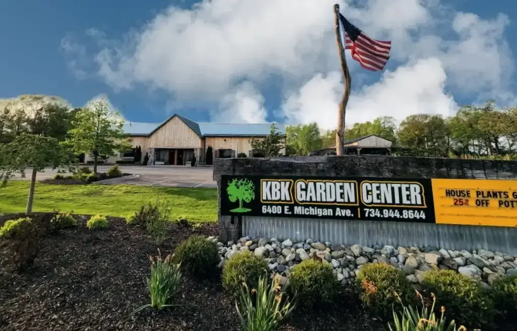 KBK Garden Center sign with American flag and main building